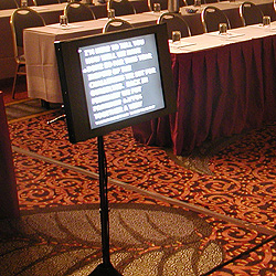Teleprompter use before a live audience.